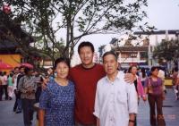 Jun and his parents in China