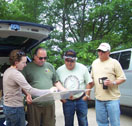Odawa consultants (with Kacy Hollenback) identify traditional resources on a historic map of the Leelanau Peninsula, Michigan
